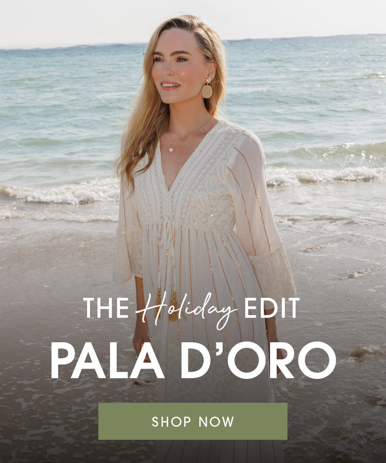 Woman in a white dress standing on a beach with text overlay for Pala d'Oro.