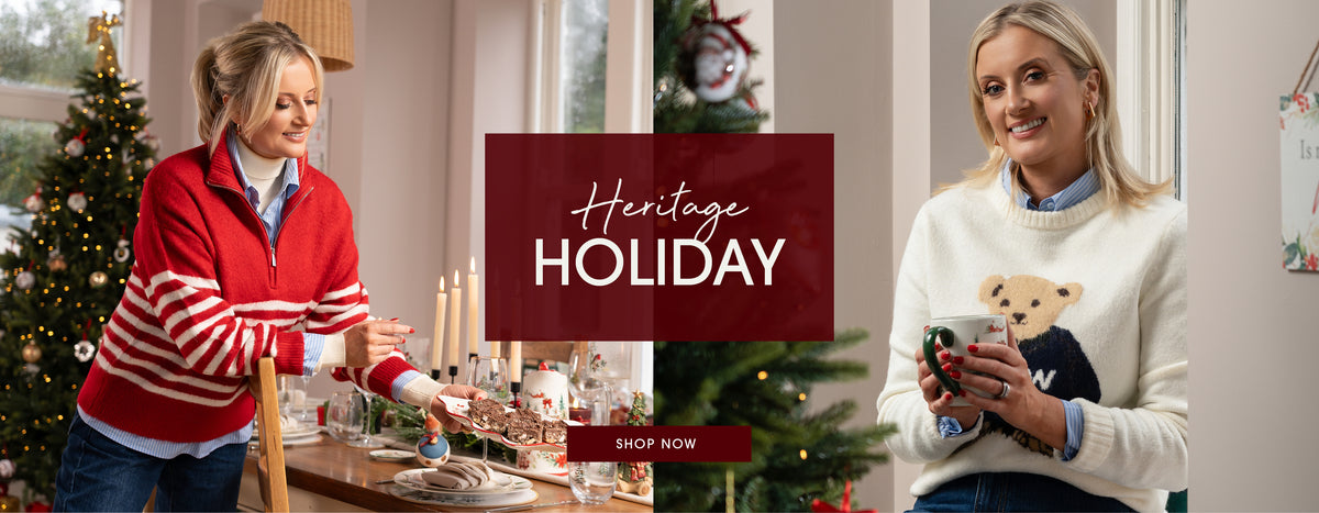 A festive holiday promotional banner featuring two women in cozy sweaters in a decorated living room. On the left, a woman wears a red and white striped quarter-zip sweater next to a Christmas tree.