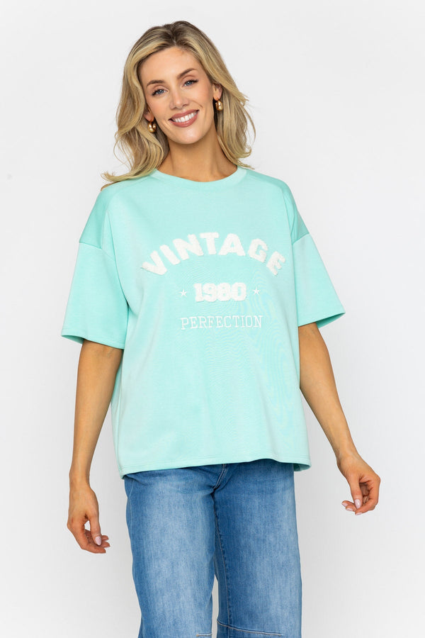 Carraig Donn Aqua Viscose Blend Slogan Top