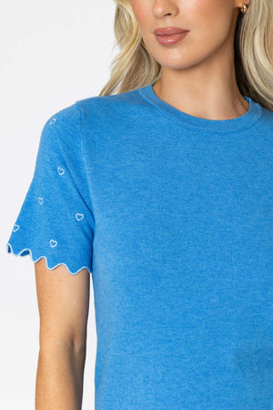 Carraig Donn Blue Knit Top with Scalloped Sleeves and Heart Detail