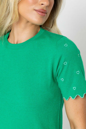 Carraig Donn Green Knit Top with Scalloped Sleeves and Heart Detail