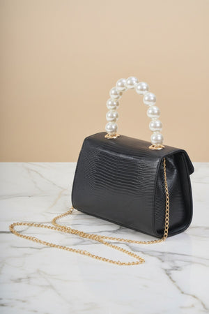 Carraig Donn Pearl Top Handle Clutch Bag in Black