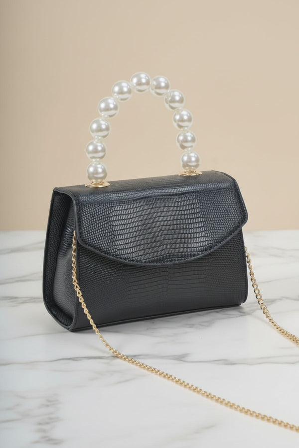 Carraig Donn Pearl Top Handle Clutch Bag in Black