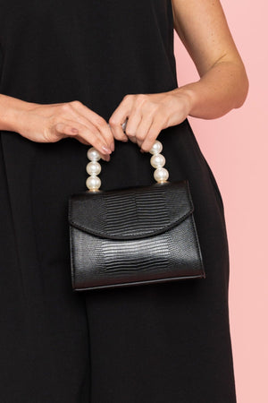 Carraig Donn Pearl Top Handle Clutch Bag in Black