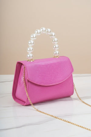Carraig Donn Pearl Top Handle Clutch Bag in Fuchsia Pink