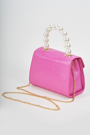 Carraig Donn Pearl Top Handle Clutch Bag in Fuchsia Pink