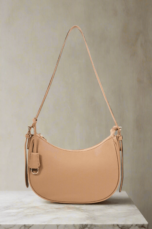 Carraig Donn Tag Crescent Shoulder Bag in Beige