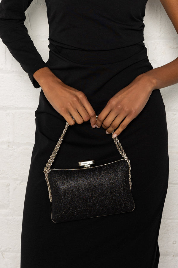 Carraig Donn Textured Clutch Bag in Black