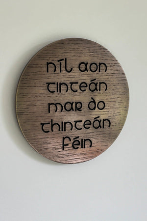 Carraig Donn NíL Aon TinteáN Mar Do ThinteáN FéIn Bronze Wall Art
