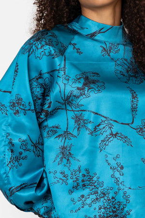 Carraig Donn Teal Print Satin High Neck Long Sleeve Blouse