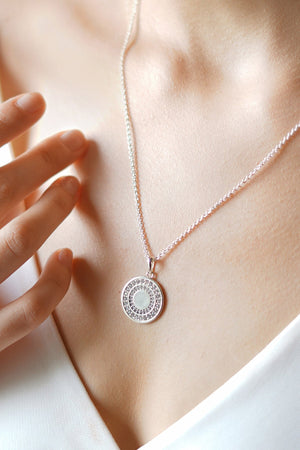 Circular Pendant with Clear Stones