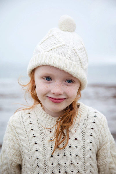 Carraig Donn Handknit Merino Wool Kids Bobble Hat in White